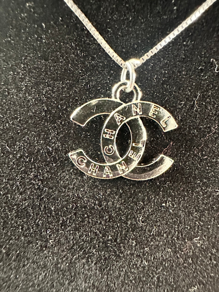 The “Silver Script CC” Necklace