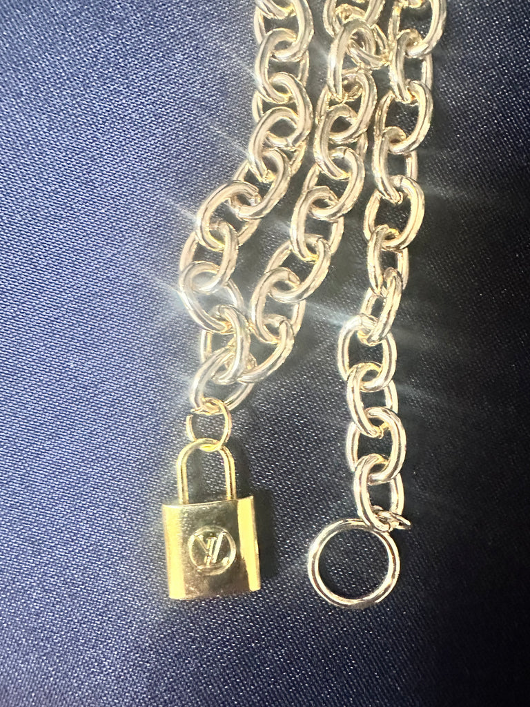 Louis Vuitton Gold Lock