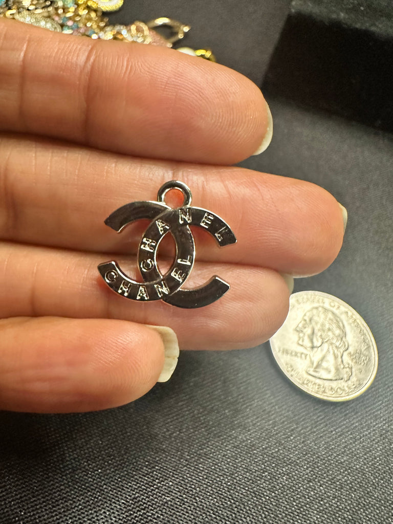 The “Silver Script CC” Necklace