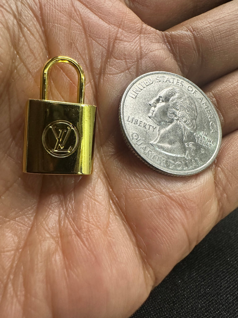 The “LV Lock” (Gold)Necklace