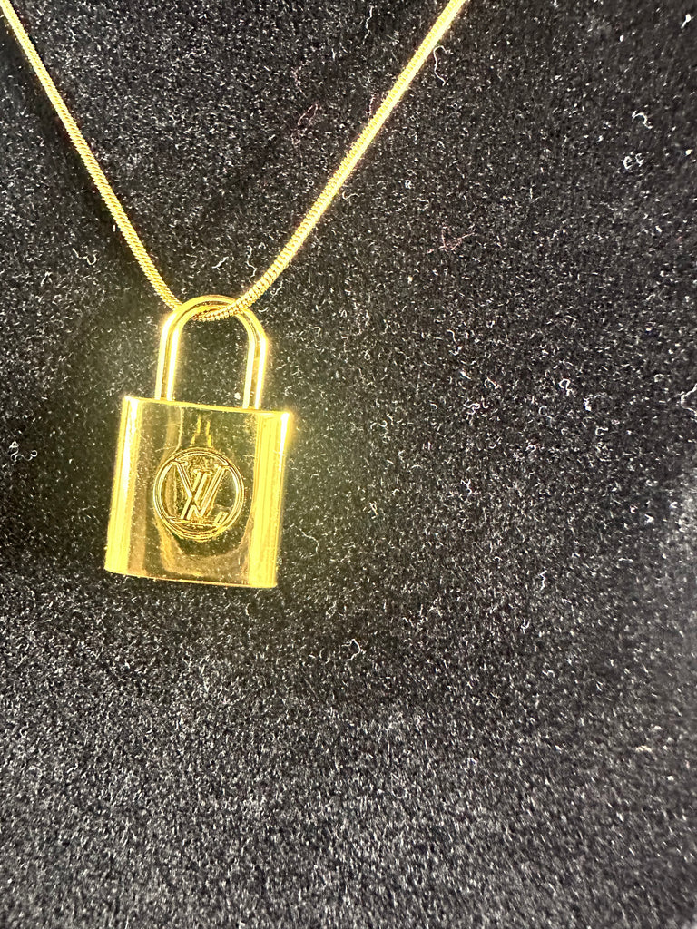 The “LV Lock” (Gold)Necklace